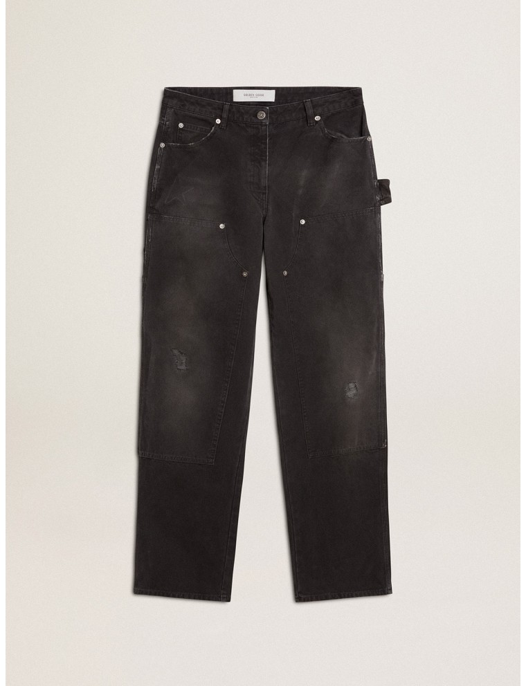 Jeans da donna in cotone di colore nero con effetto distressed con patch frontali