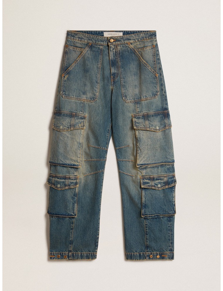 Pantalone blu jeans dal trattamento distressed