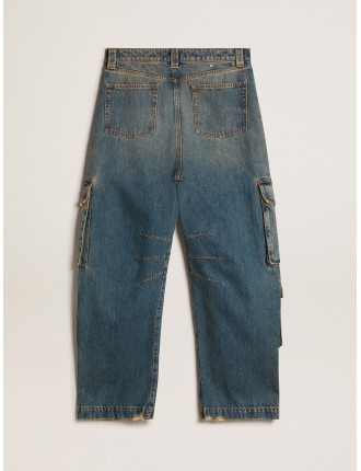 Pantalone blu jeans dal trattamento distressed