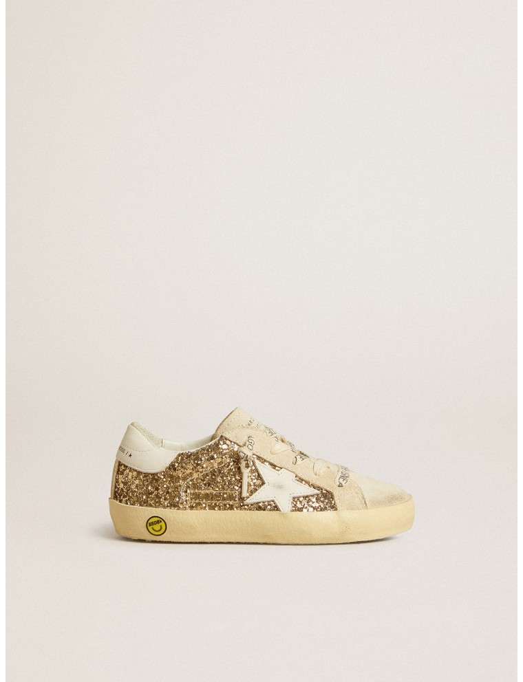 Super-Star Junior in glitter oro con stella e talloncino in pelle bianca