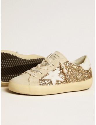 Super-Star Junior in glitter oro con stella e talloncino in pelle bianca